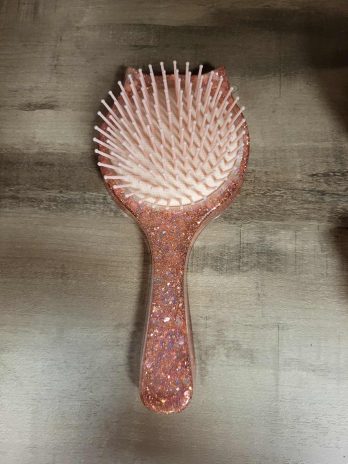 Brosse à cheveux corail à paillettes