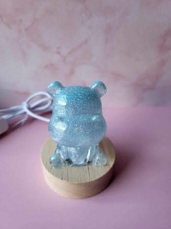 Vielleuse hippopotame bleu avec paillettes.