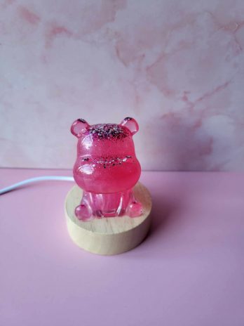 Vielleuse hippopotame rose avec paillettes.