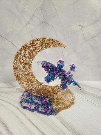 Décoration lune fée paillettes or, bleu et violet.